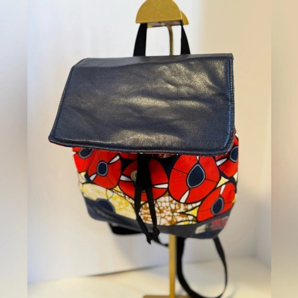 Designs By IvoryB cloth backpack purse